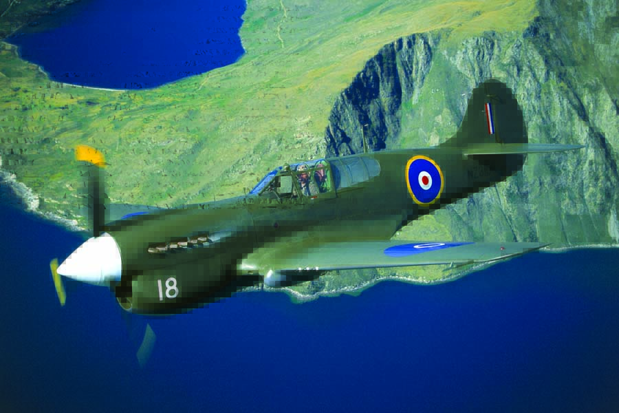 RNZAF utilized the Kittyhawk in the Pacific Theater, and this short-tailed version of the Curtis fighter was restored and flown by The Alpine Fighter Collection from its Wanaka base for many years. John Lamont is the pilot. (Photo by John Dibbs/Facebook.com/theplanepicture)