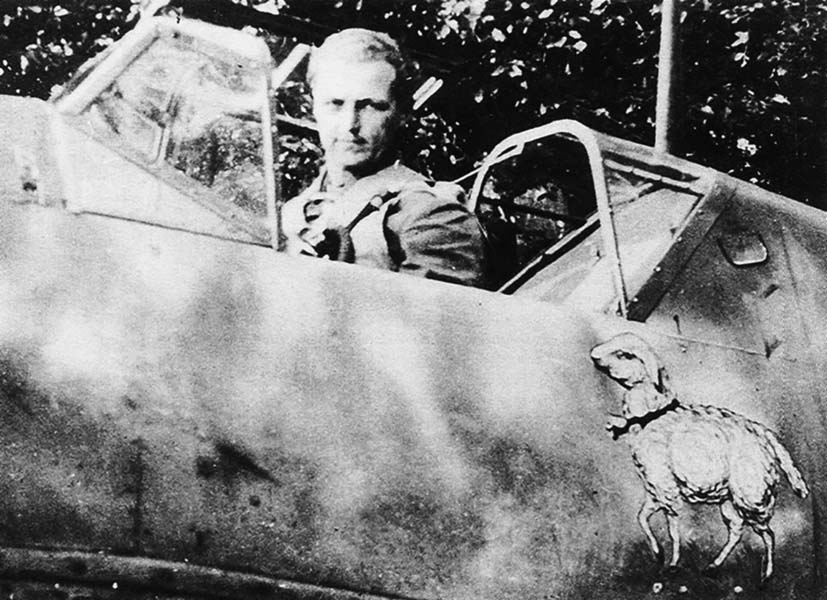 A rather poor and grainy photo, but the only one known to exist of Fw. Eduard “Edi” Hemmerling, sitting in a 6.JG51 Bf 109E-1 in France in 1940. The significance of the sheep emblem is not known. (Photo author’s collection)