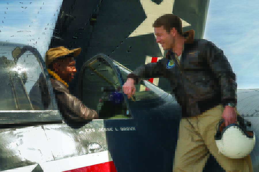 Actor Jonathan Majors as Jesse Brown in-cockpit with actor Glen Powell, who portrays LTJG Thomas Hudner Jr., on the right wing. (Photo by Eli Adé/ Columbia Pictures)
